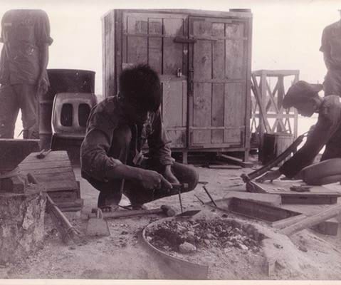 Prisoners of war at work making the artificial limbs