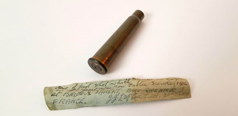 Spent cartridge and inscription, 1916 Shrine Collection