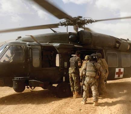 Afghan, American and Australian Soldiers load up 23 September 2011