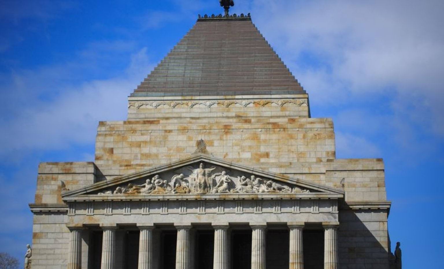 An external shot of the Shrine of Remembrance on a sunny day