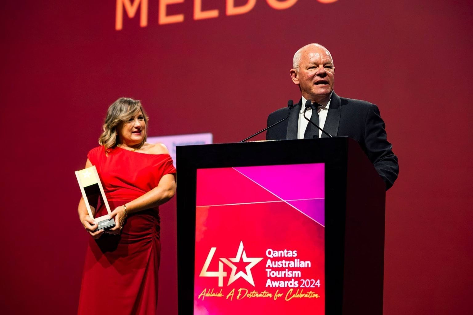 Shrine CEO Dean Lee accepts the Gold award for Cultural Tourism